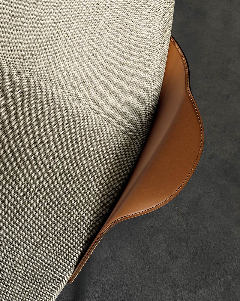 Hull armchair, fabric and leather shell | Dallagnese