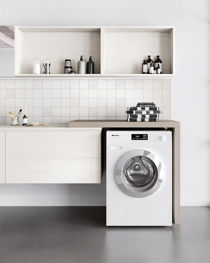 Worktop with end side panel above washing machine | Hydrobox equipped laundry | Birex
