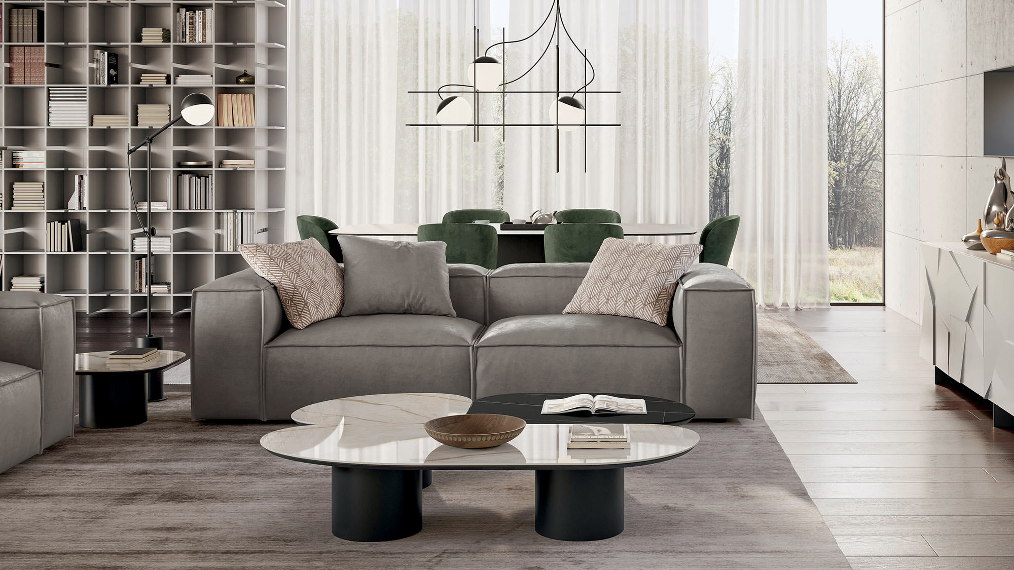 Comfort sofa, Concrete sideboard, Atollo side tables and Bookrid bookcase | Dallagnese
